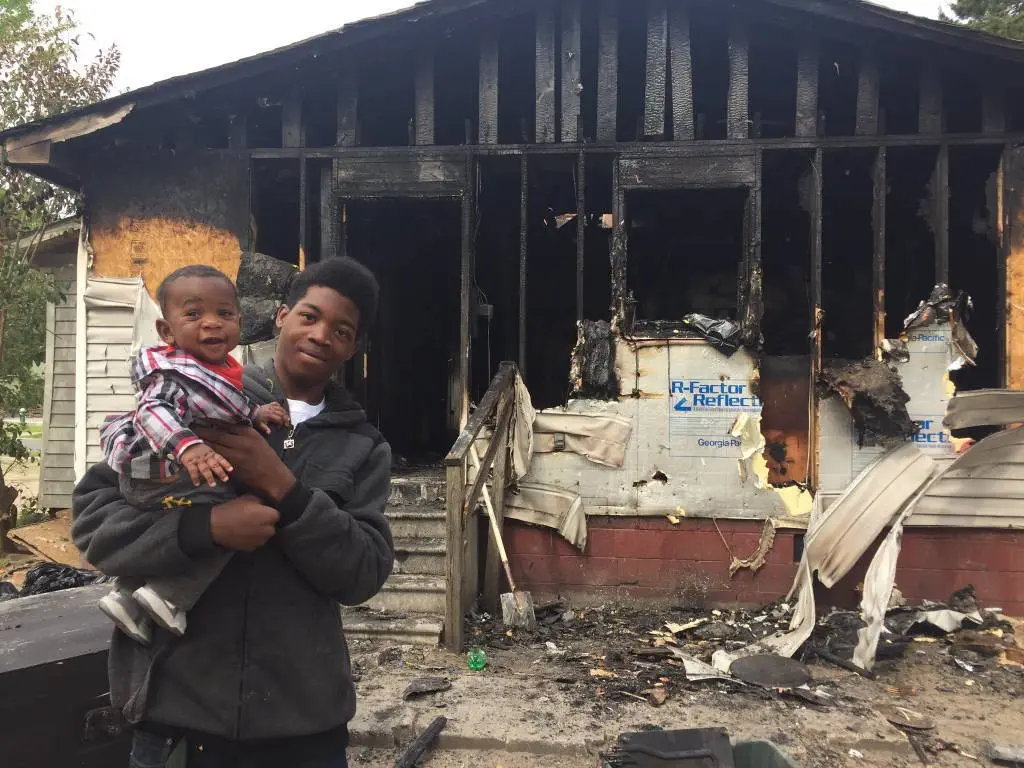 Kinston teen Jarraine “LJ” Gray and his baby cousin, Michari Strayhorn